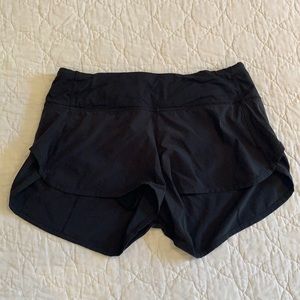 Black Lululemon athletic shorts. Size 4
